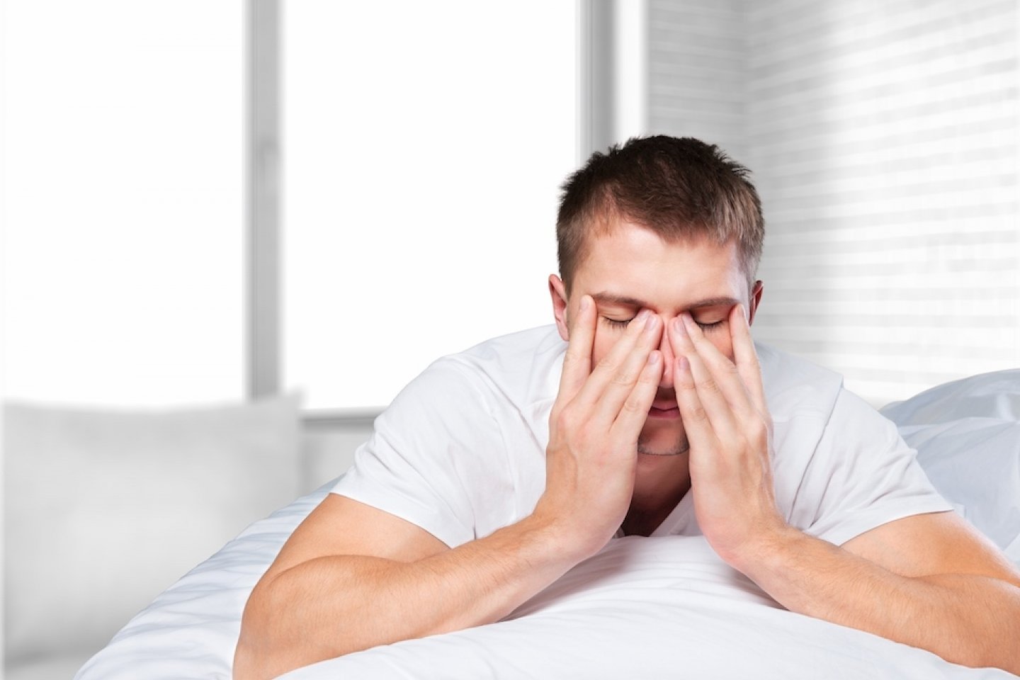 Tired man taking a pause from work