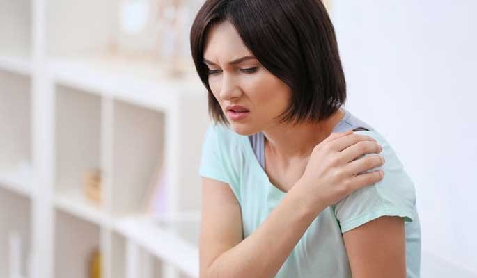 Woman pausing during an everyday comfort moment